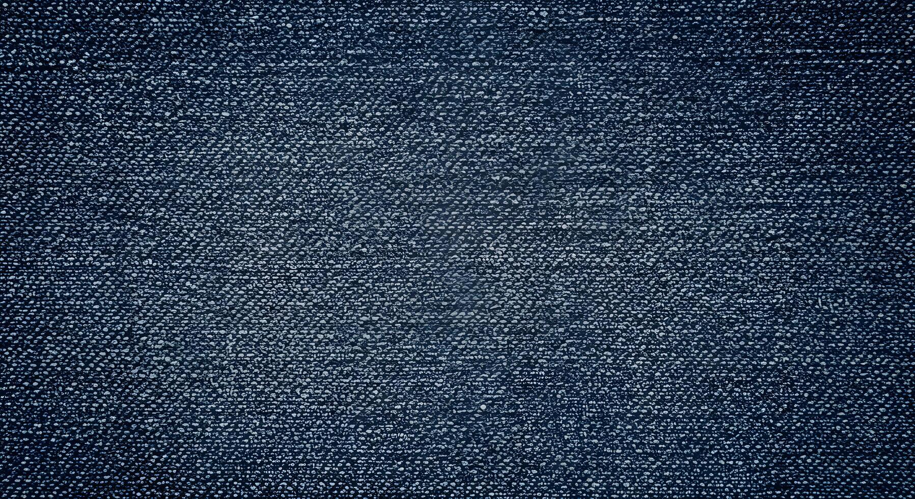 denim swatch showing thread detail and weave pattern, great for fashion blogs, fabric catalogs, or web design. photo