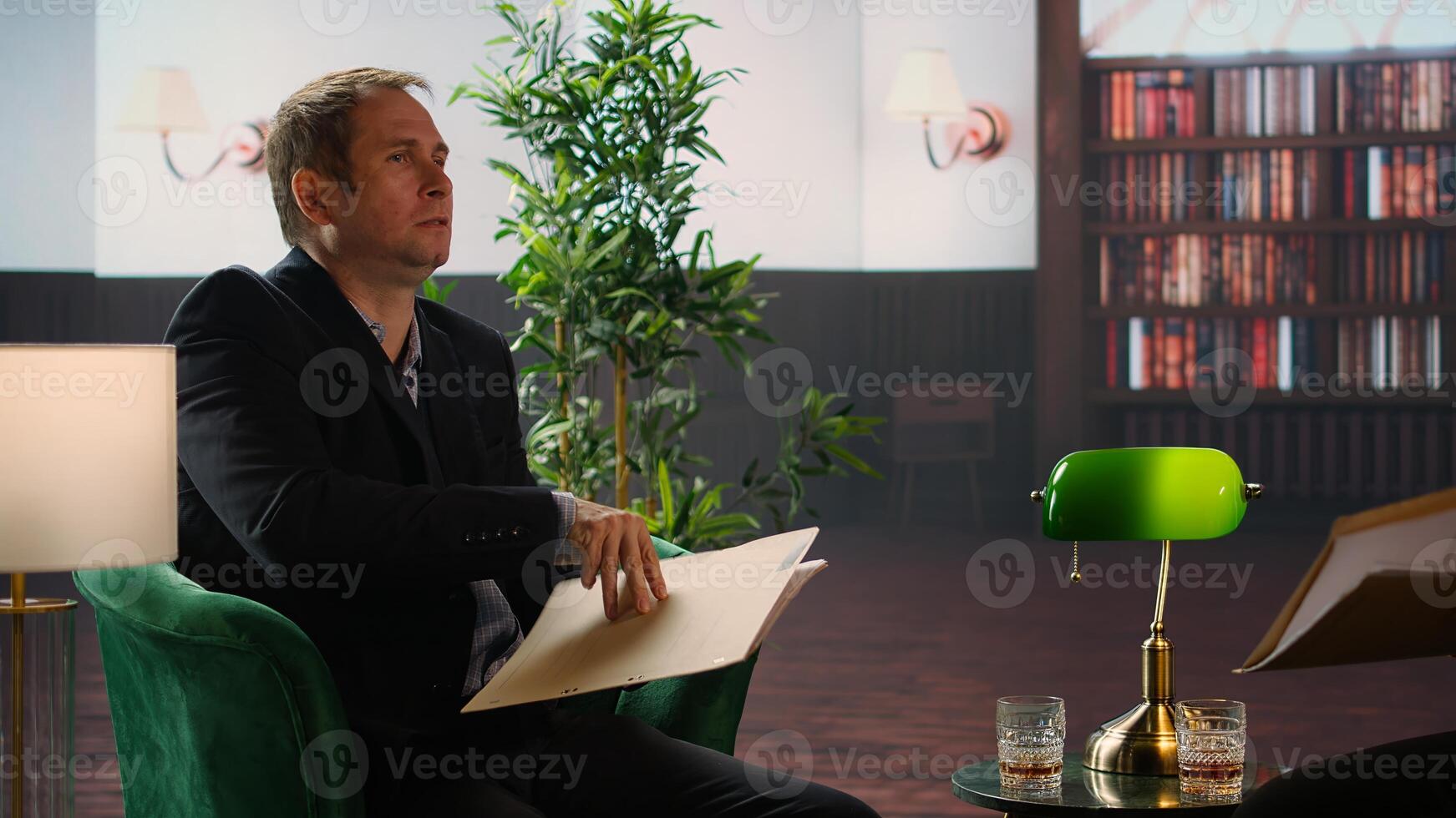 Two espionage agents reviewing confidential documents in a vintage library, emphasizing secret service teamwork and strategic planning for a mission. Reading government reports. Camera A. photo