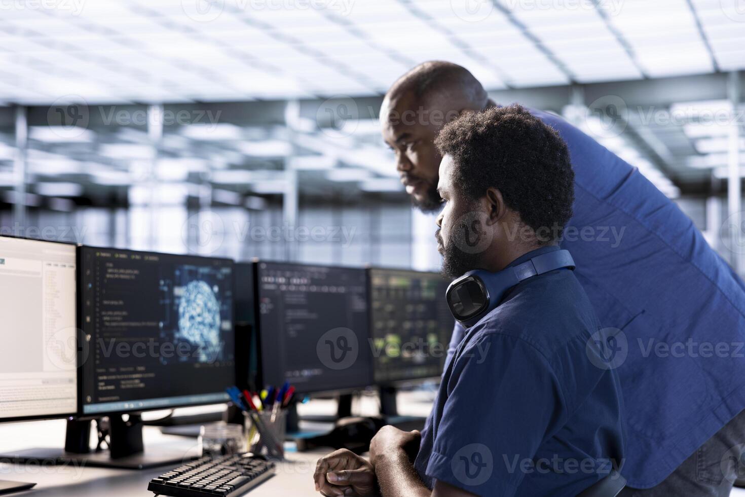 Teamworking server hub coworkers doing AI research, implementing algorithms using neural networks. Team of technicians brainstorming in data center, using artificial intelligence computational models photo