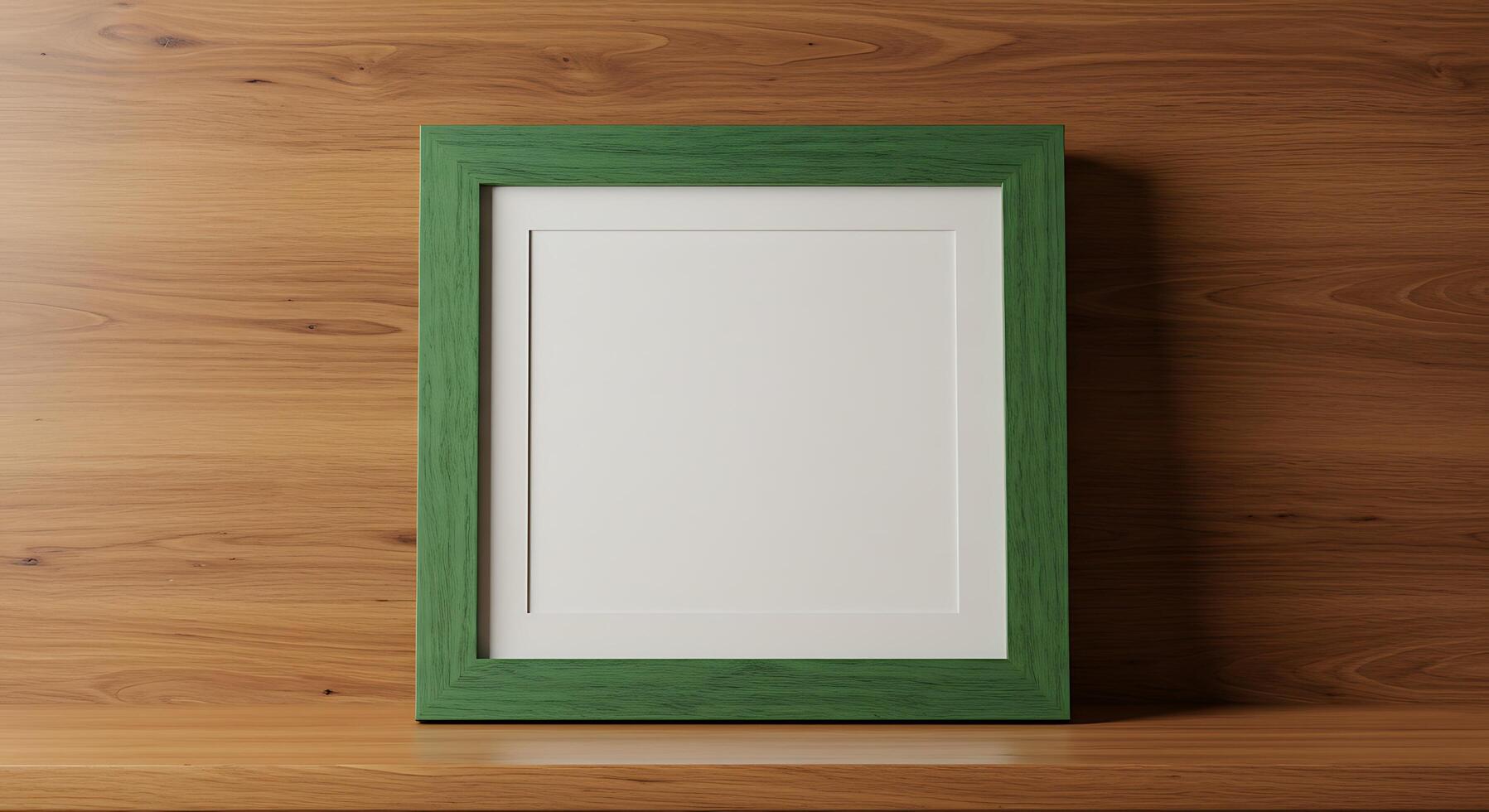 Green frame on wooden table with white background photo