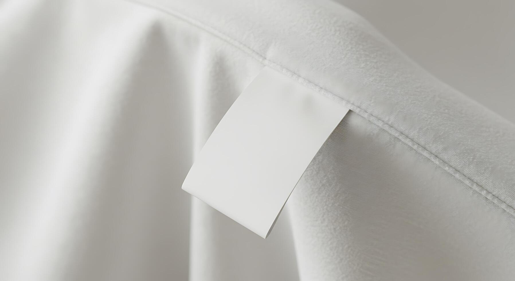 A white shirt with a tag on it photo