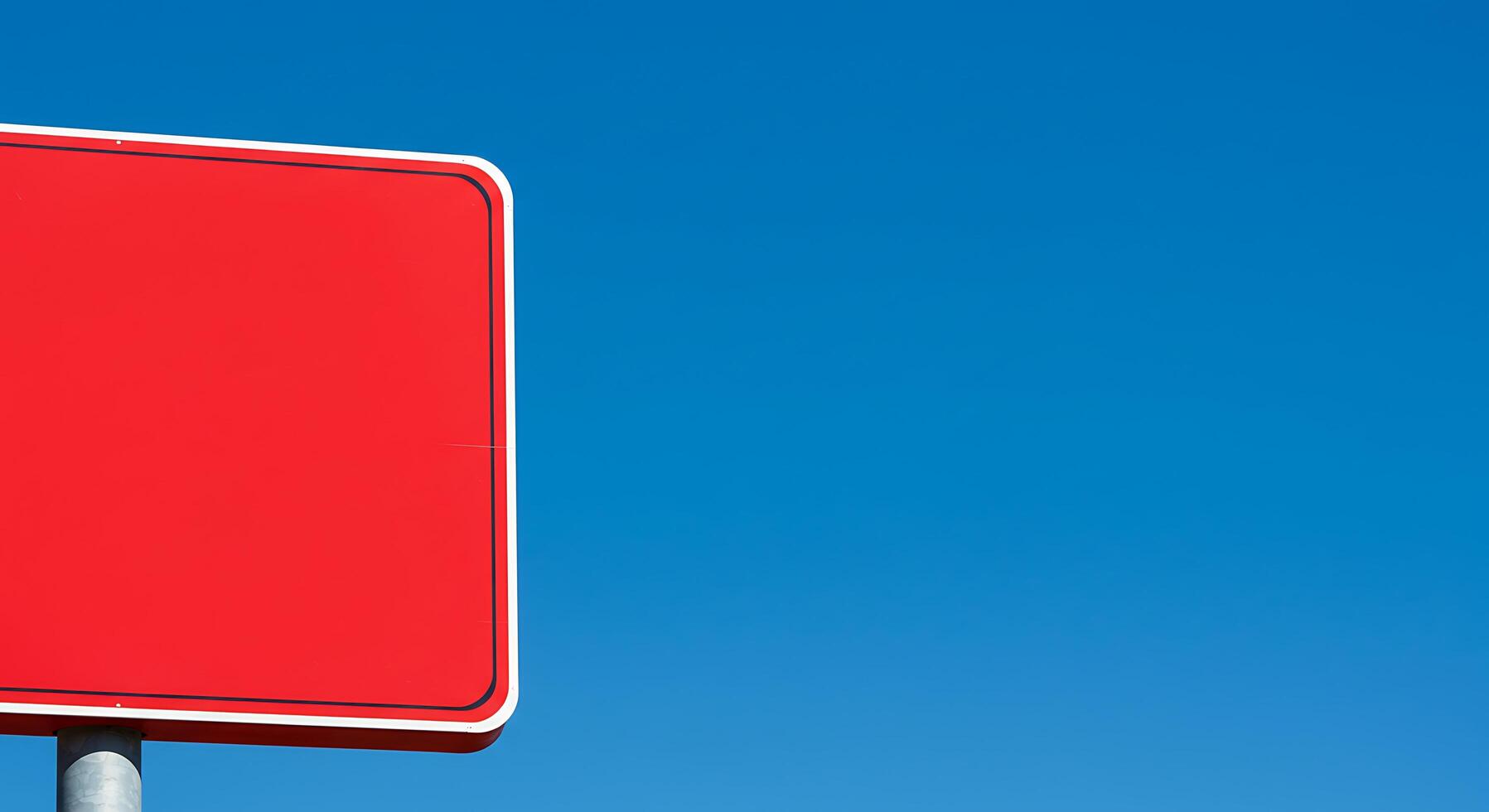 A red sign with a blue background photo