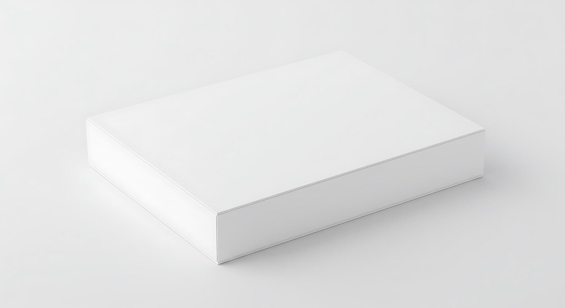 A white box sitting on a table with a blank surface photo