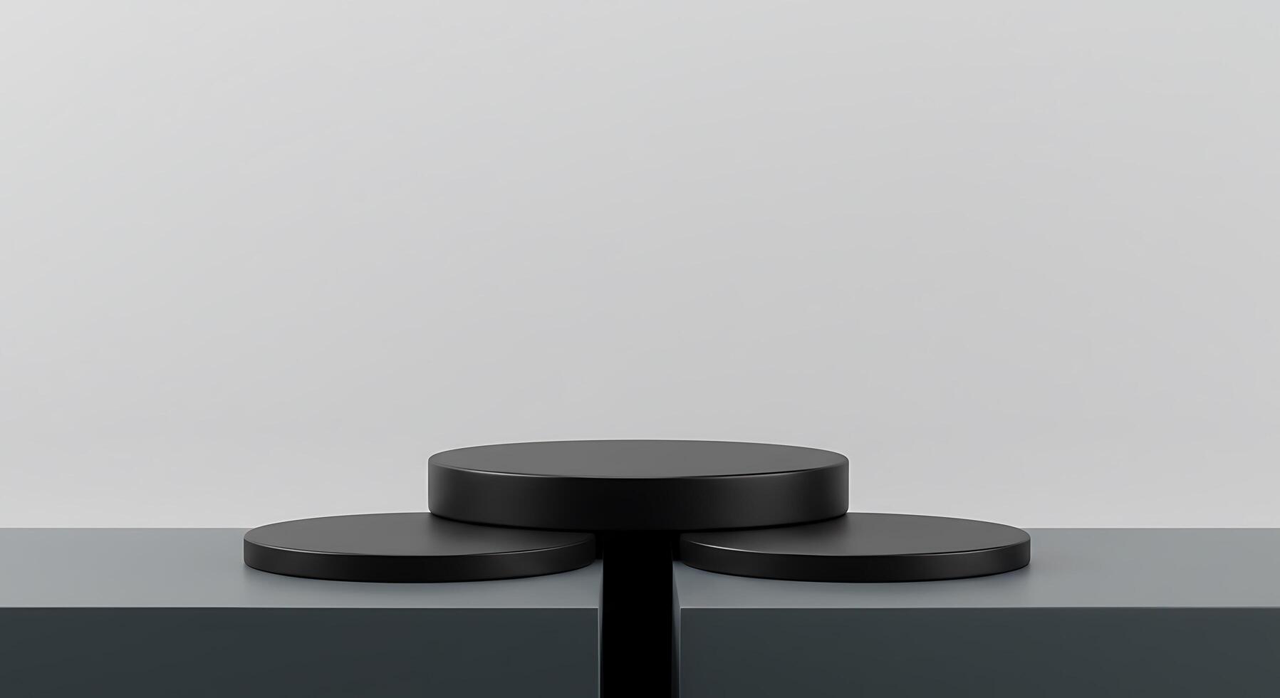 Three black pedestals on a white surface photo