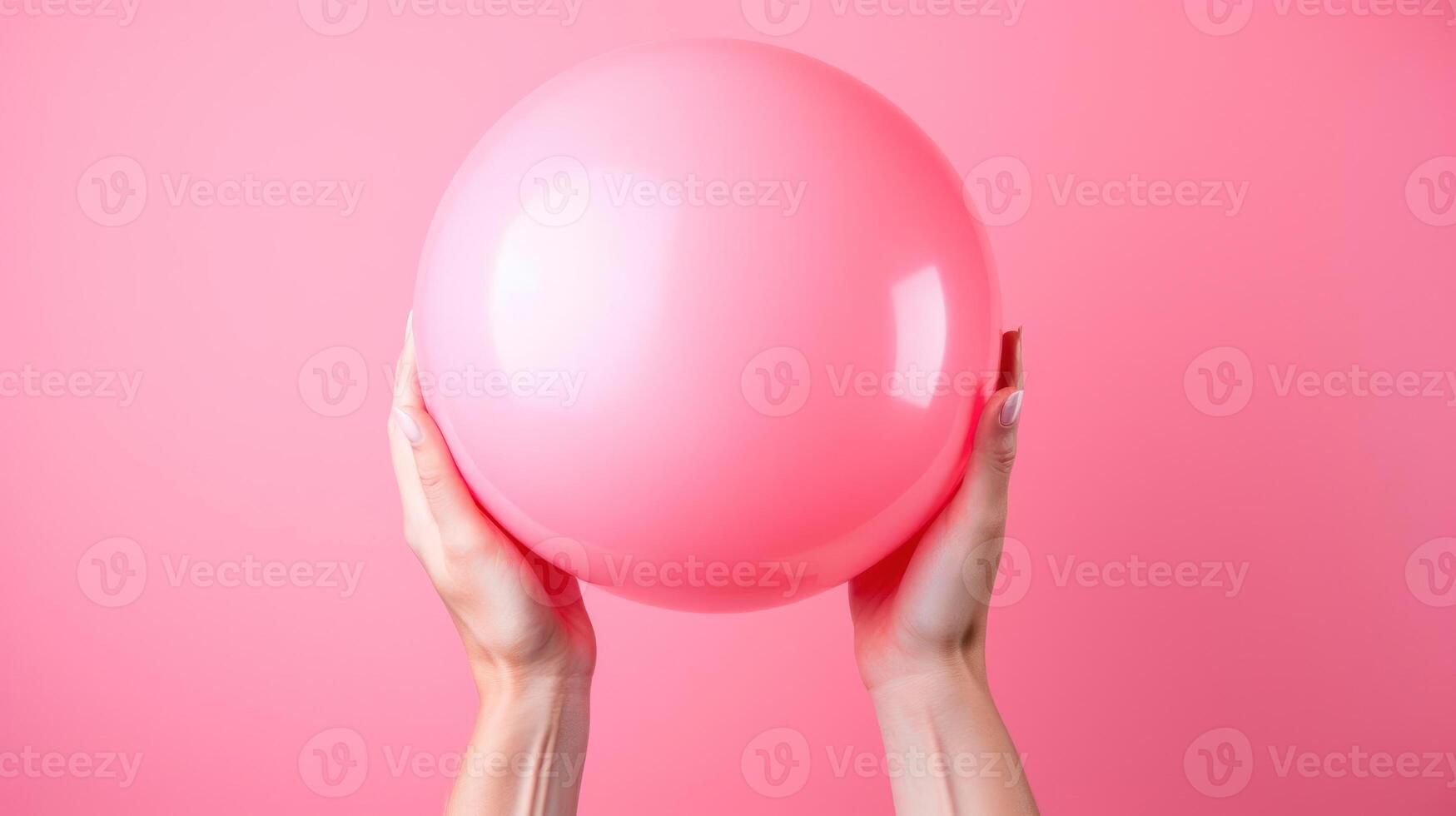 Holding a pink balloon photo