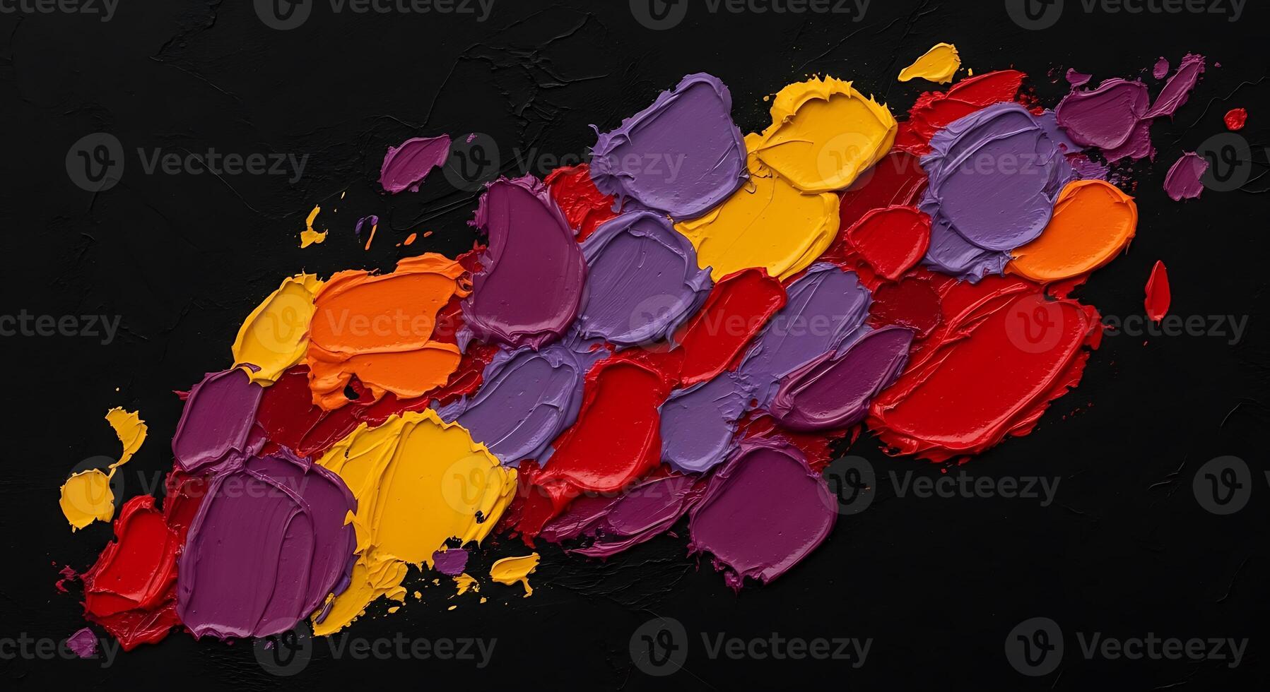 Colorful paint splatters on a black background photo