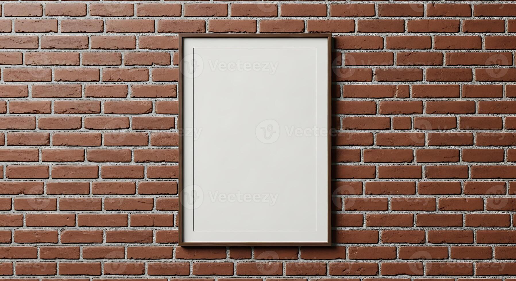 A blank frame hanging on a brick wall photo