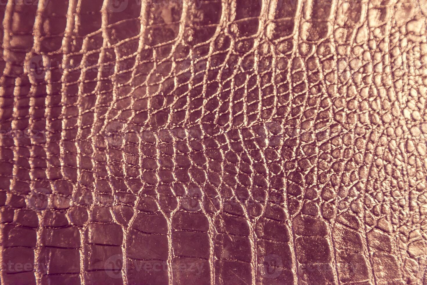 A close up of a leather surface with a pattern photo