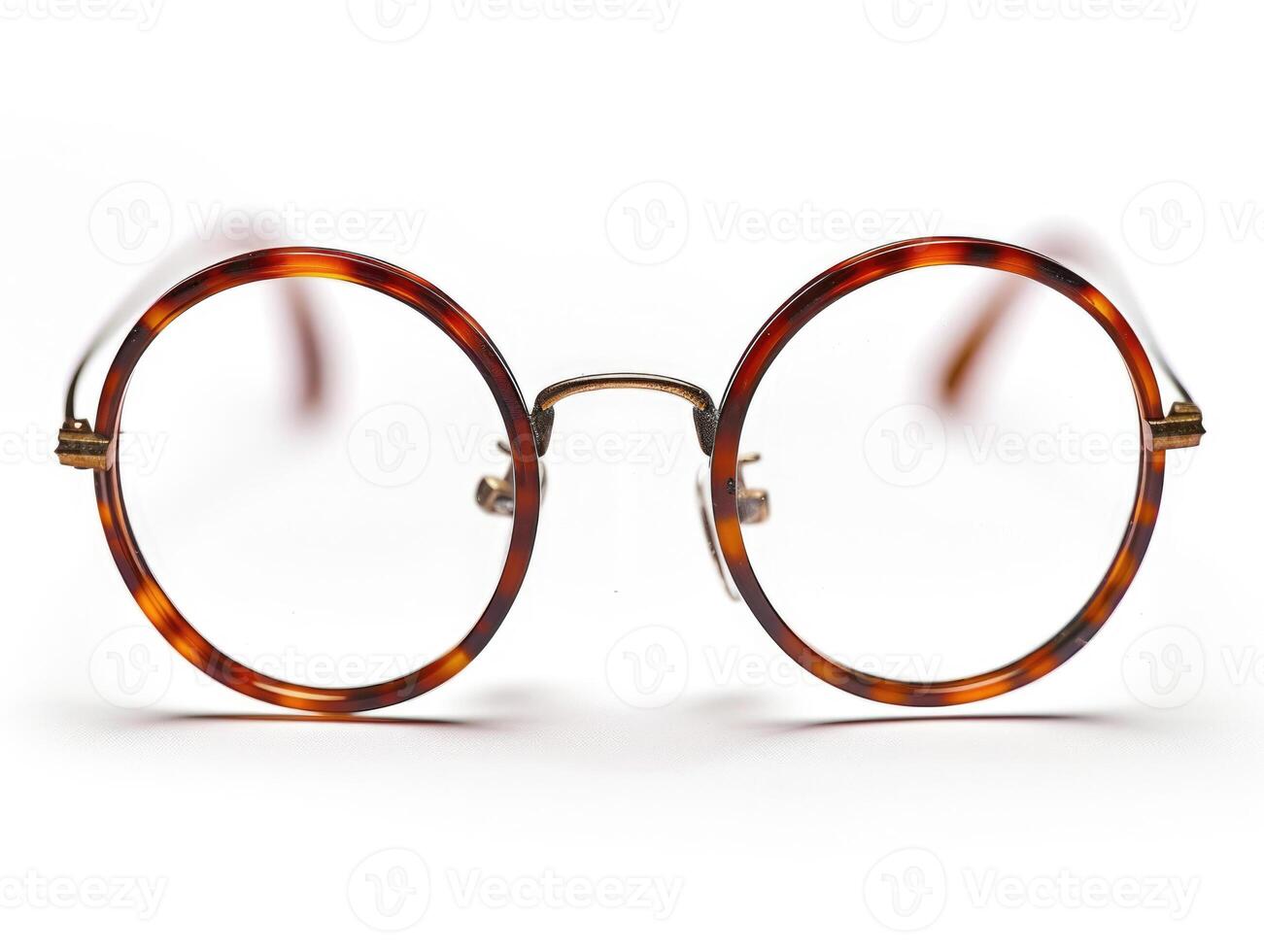 A pair of glasses with a tortoise shell design photo