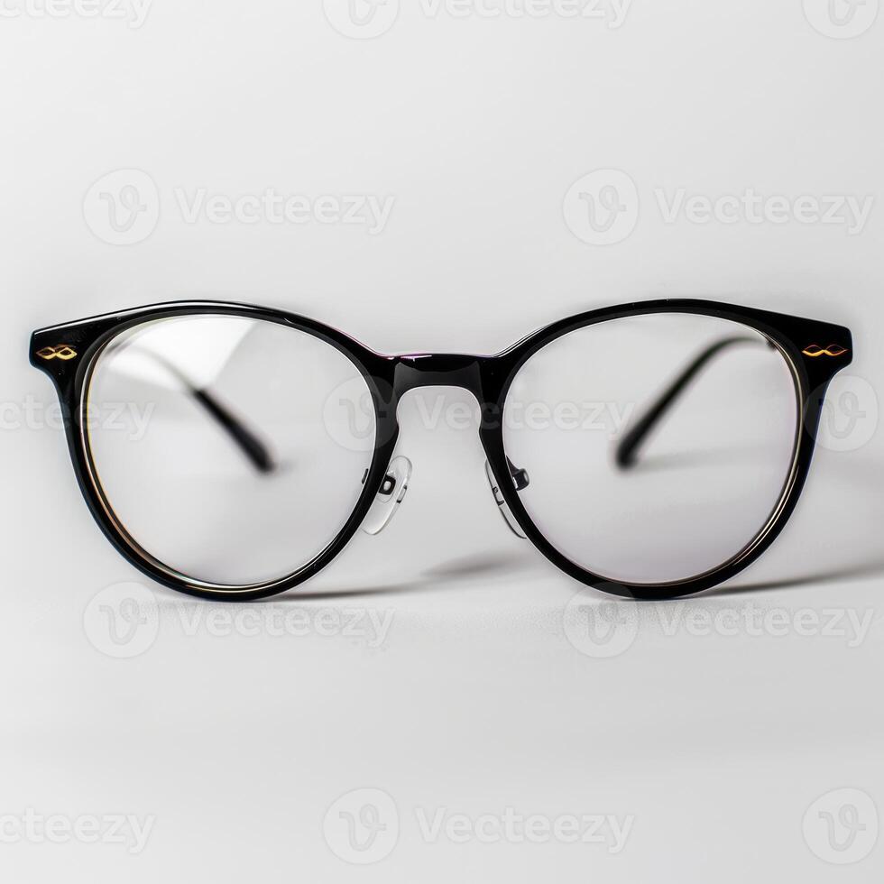 A pair of glasses with black frames and clear lenses photo