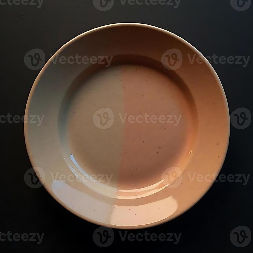 Simple Plate with Soft Lighting and Subtle Color Variations Overhead Shot photo