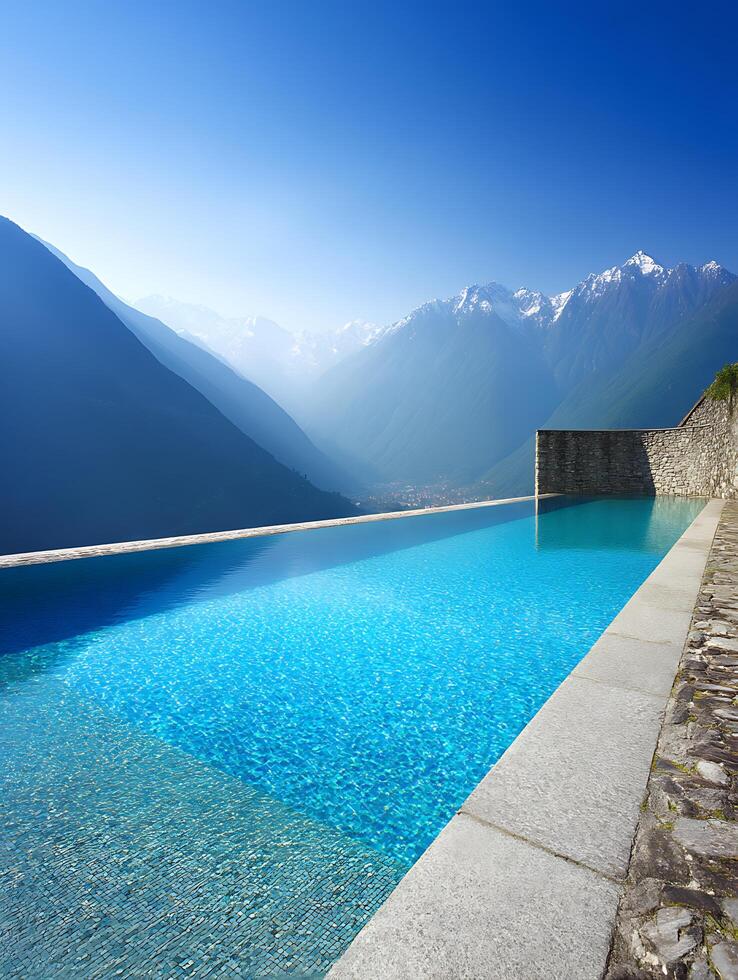 Infinity Pool with Stunning Mountain View Luxury Resort in the Alps. photo