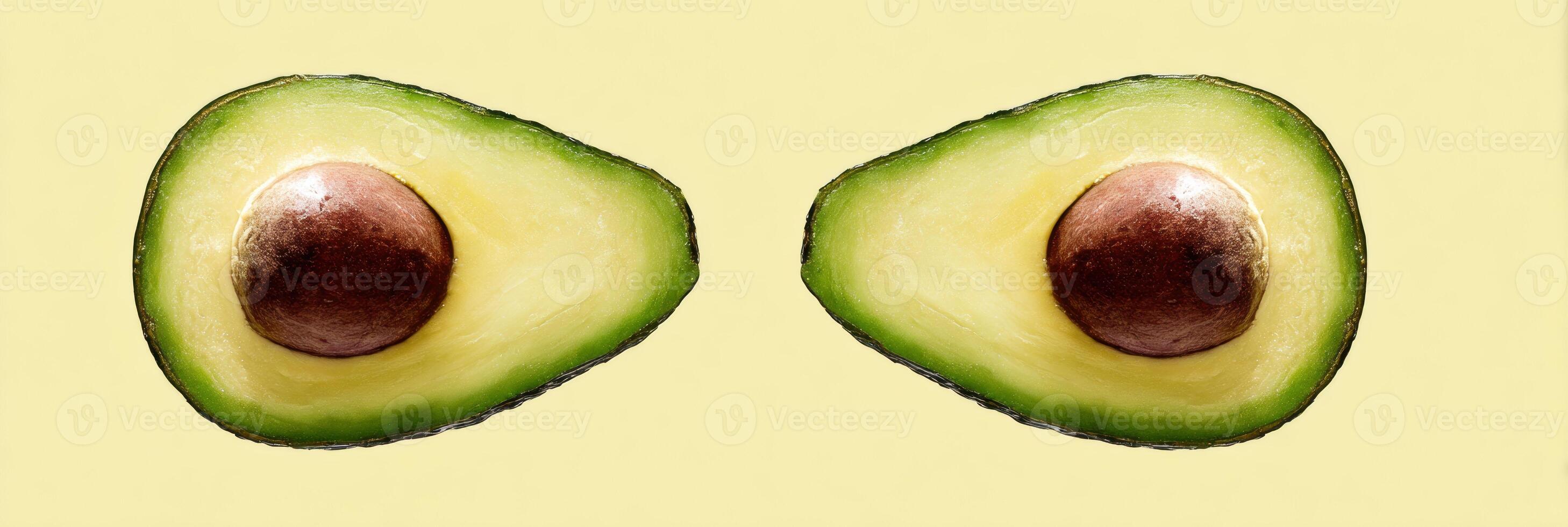 Mirrored Avocado Halves With a Clean Background Showcasing Vibrant Colors and Intriguing Symmetry photo