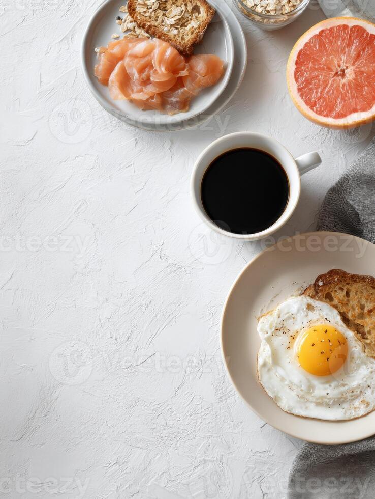 Breakfast Setup for Pet Featuring Toast, Salmon, Egg, Grapefruit, Coffee, and Oatmeal in a Cozy Kitchen photo