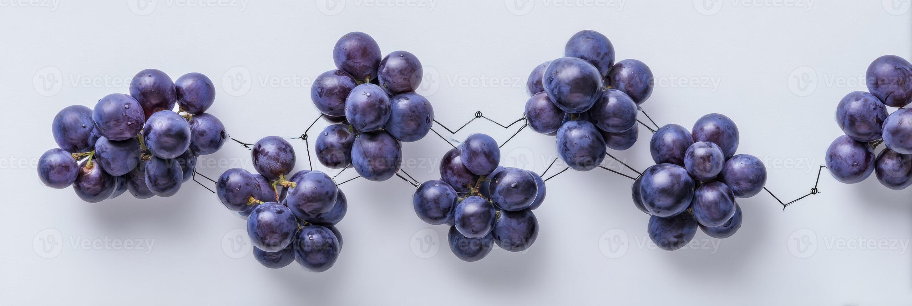 Clustered Grapes Resembling Molecular Formations on a Soft White Backdrop in a Clean Layout photo