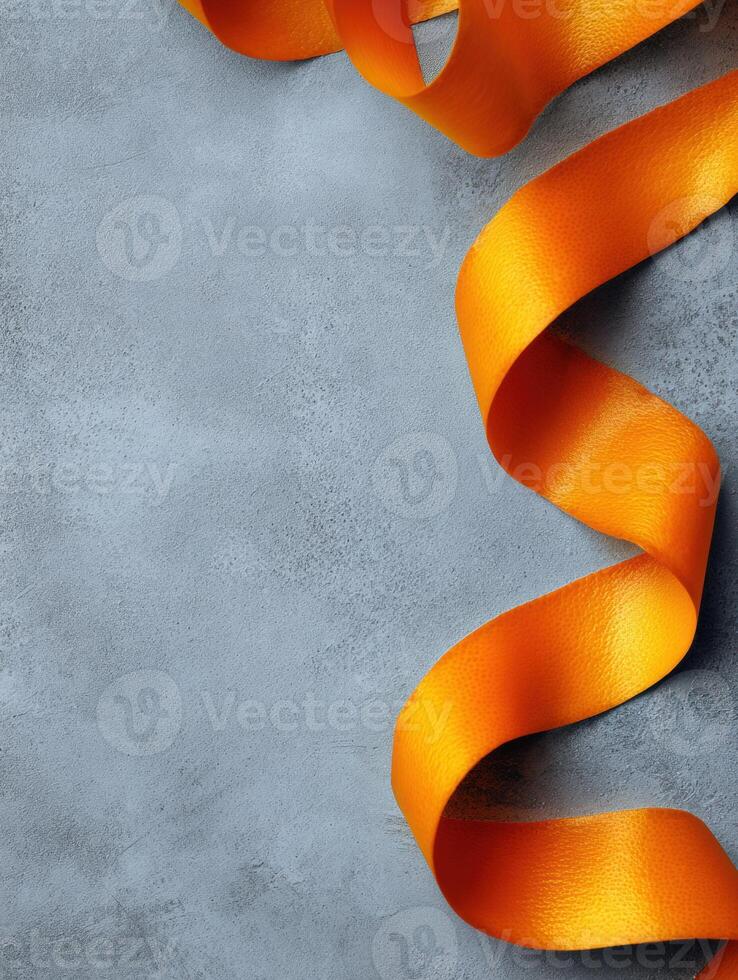 Floating Orange Zest Ribbon on a Soft Matte Background With Ample Blank Space Above for Creative Design photo