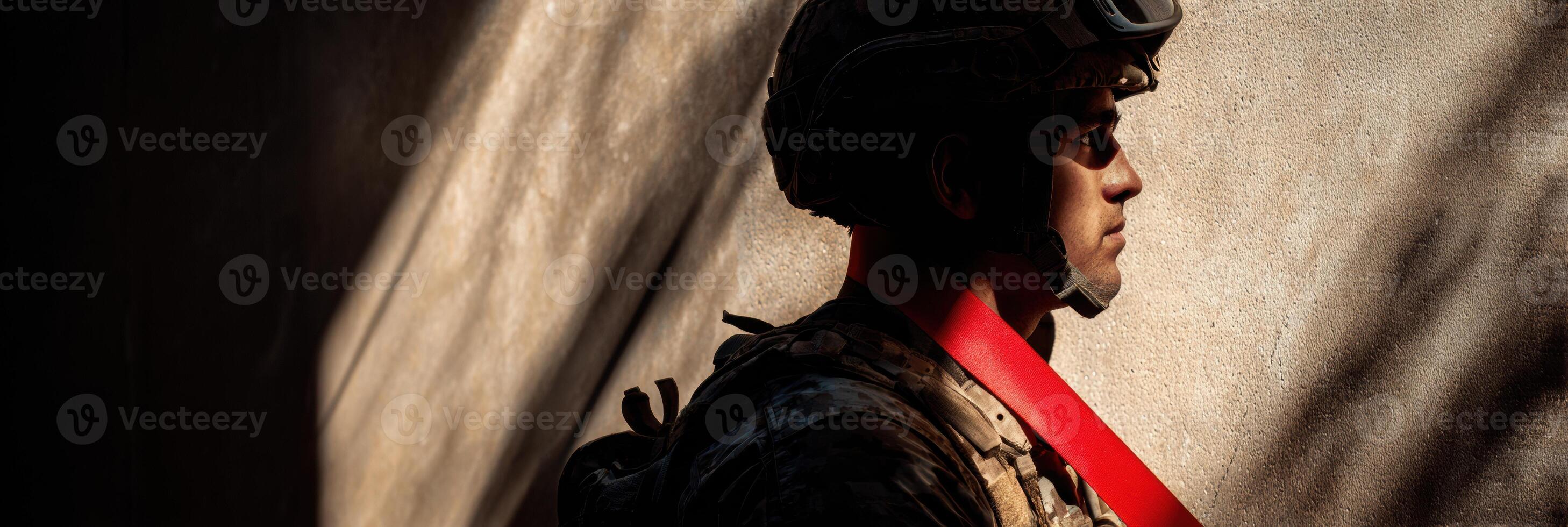 Soldier Silhouette Stands Resolute in Shadows While Holding a Light Ribbon of Support During a Mission in a Tense Environment photo