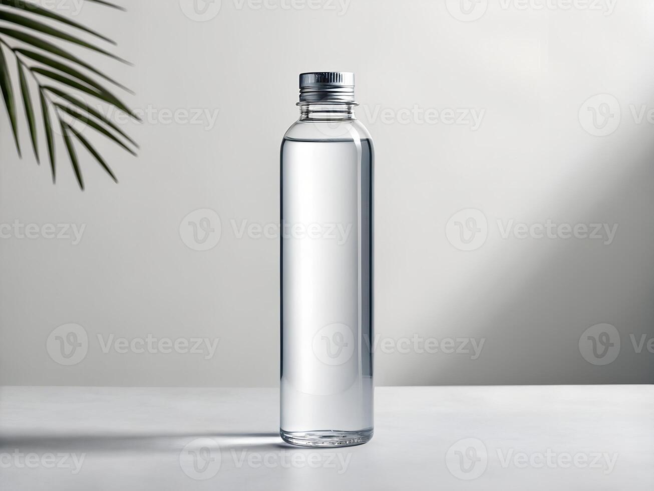 Clear Plastic Water Bottle with Silver Cap on White Background photo