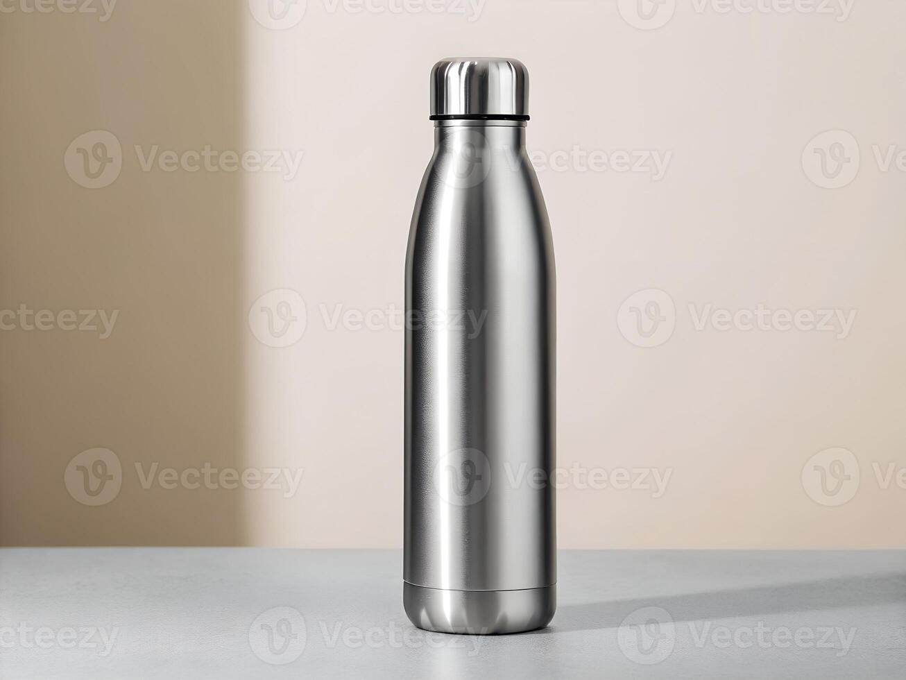 Silver Stainless Steel Water Bottle on Neutral Background photo