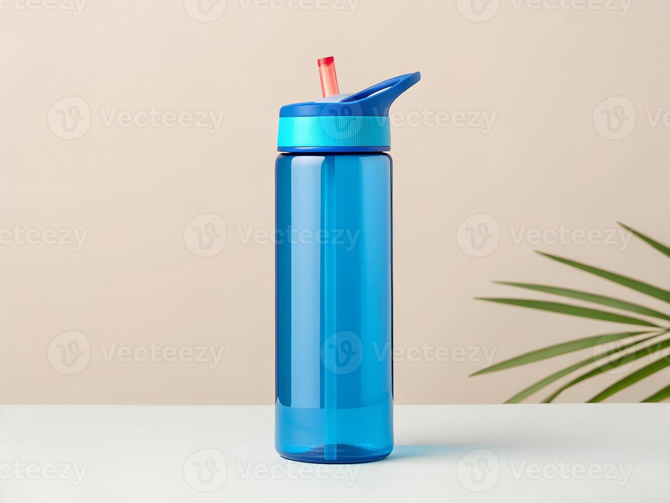 Blue Plastic Water Bottle with Straw on Beige Background photo