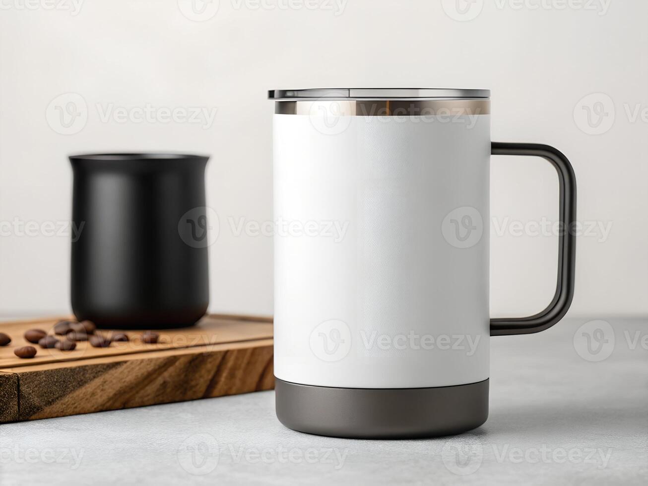 White and Dark Grey Stainless Steel Coffee Mug on Grey Surface photo