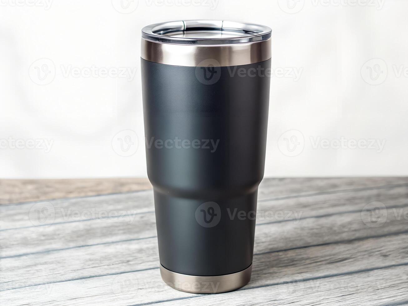 Black Matte Stainless Steel Tumbler on Wooden Table photo