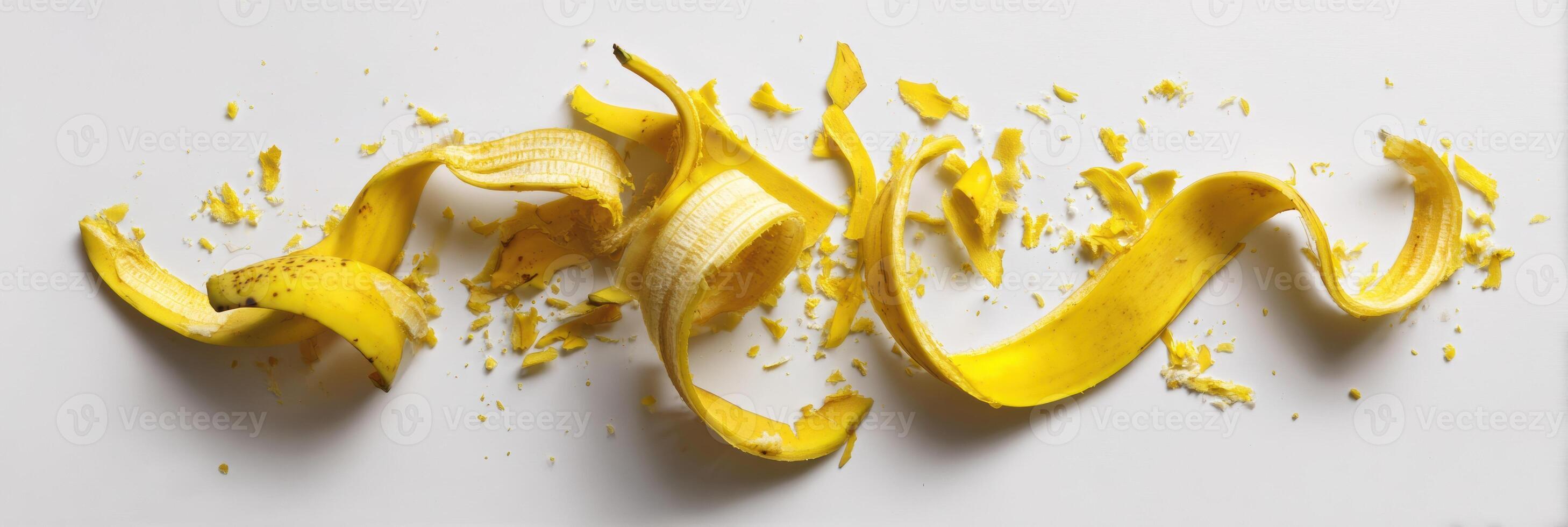 Banana Peel Abstract Composition on a Clean White Background Showcasing Bright Colors and Unique Shapes Formed by the Peel photo