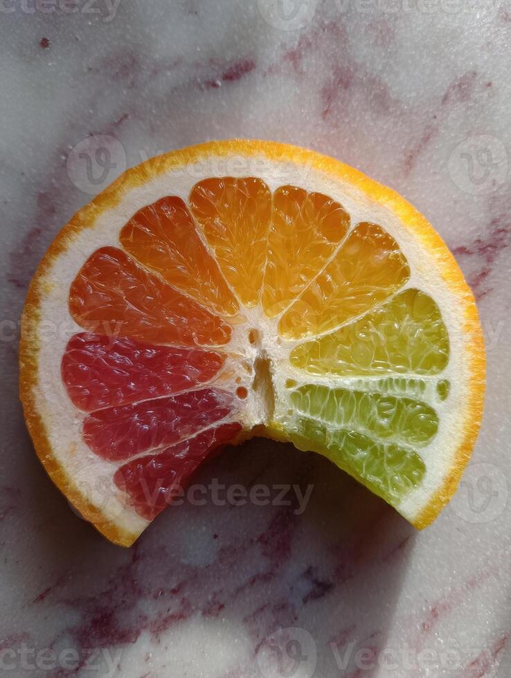 Mosaic Pattern of Vibrant Citrus Slices Forming a Semi-Circle on a Marble Surface photo