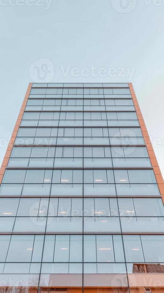 Striking Modern Glass Skyscraper Reflecting the Sky Contemporary Urban Architecture and Corporate Design photo