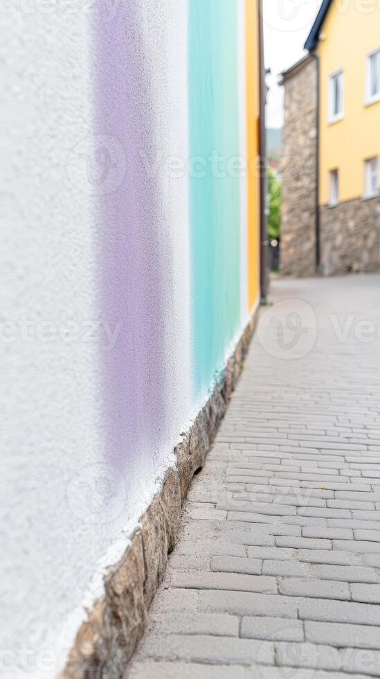 Vibrant architectural detail A modern building facade adorned with striking pastel stripes, creating a dynamic urban pathway scene with textured surfaces. photo