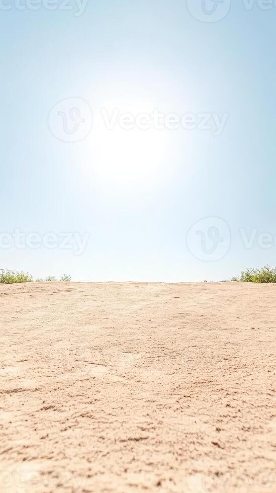 Vast Golden Sand Desert Landscape Under a Bright Blue Sky A Serene Natural Horizon with Subtle Textures and Warm Sunlight, Evoking Tranquility photo