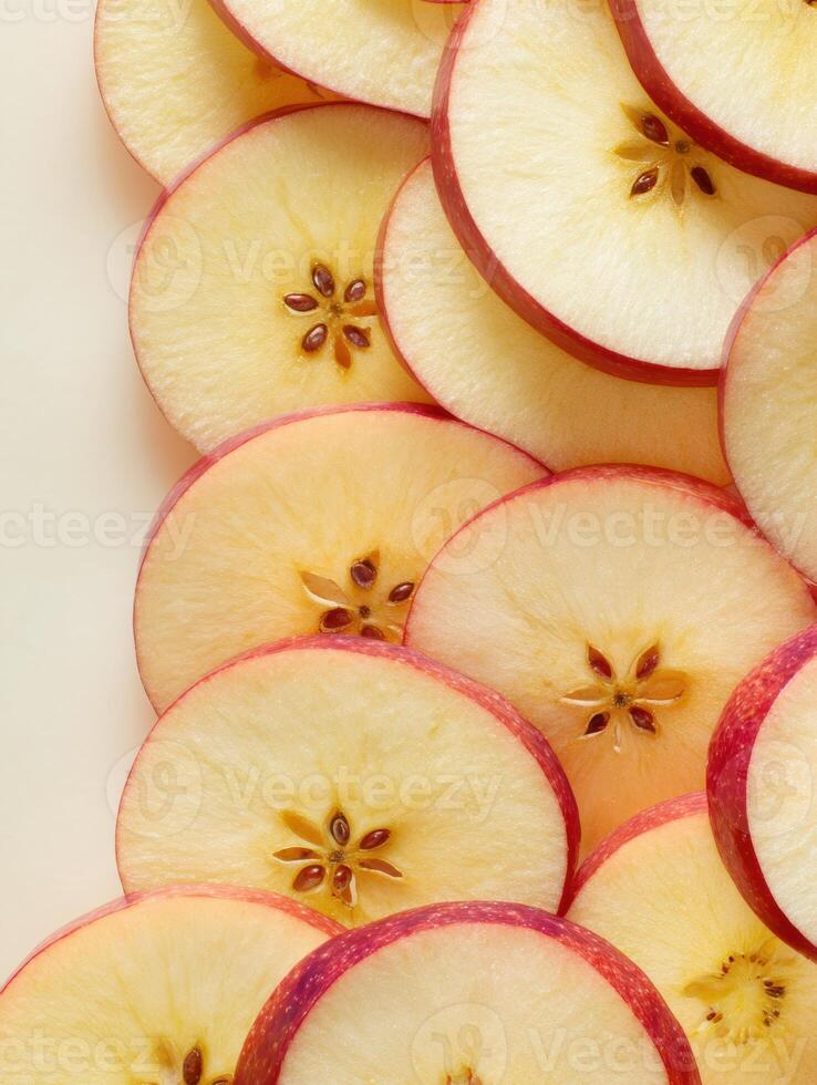 Sliced Apples Arranged Vertically With Blank Upper Area and Smooth Background for Minimalistic Presentation photo