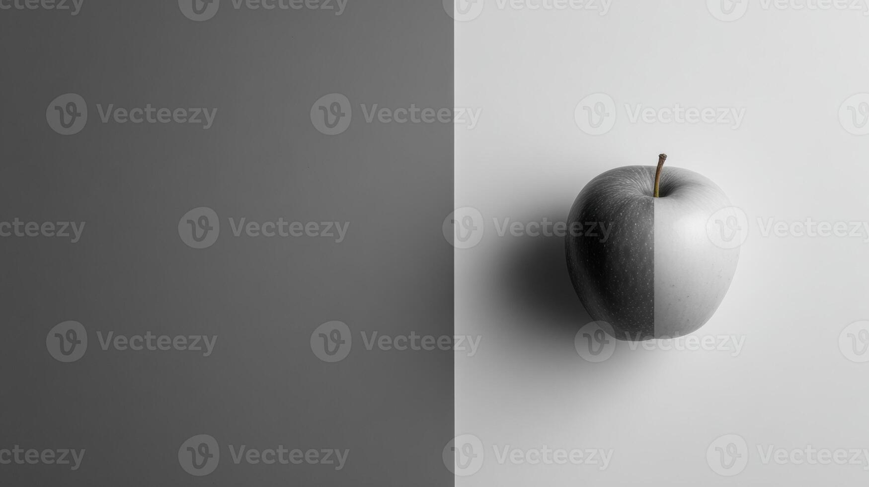 Grayscale Backdrop Featuring a Single Colored Apple Creating Minimalist Contrast in Modern Art Style photo