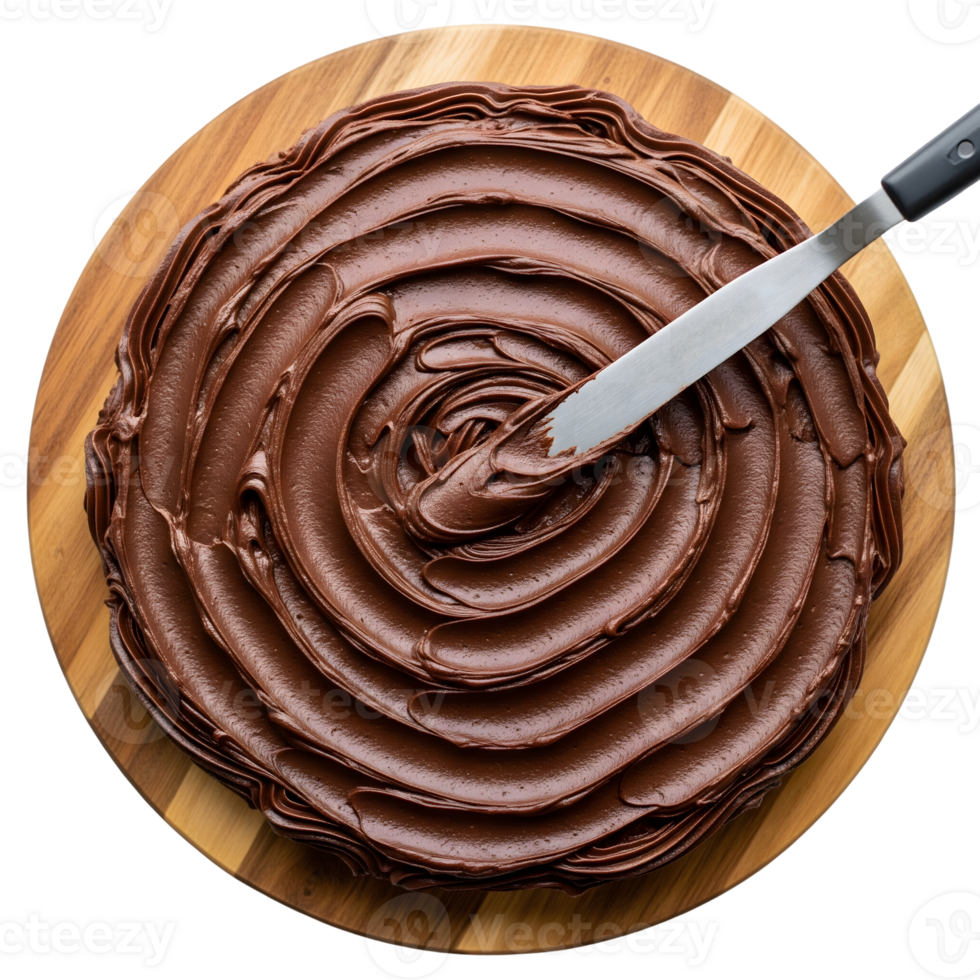 Chocolate cake is being frosted with a metal spatula on a wooden board png