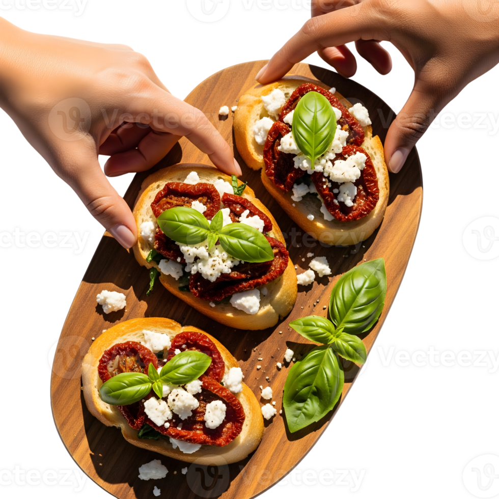 Hands are reaching for bruschetta with sundried tomatoes, feta and basil isolated on transparent background png