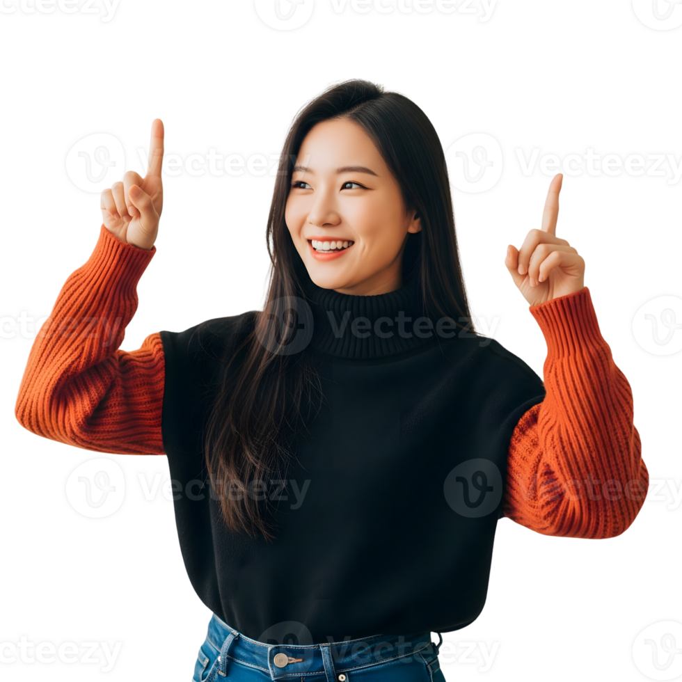 Smiling asian woman in sweater pointing upwards isolated on transparent background png