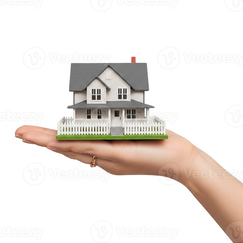 White and Gray House Model in a Woman's Hand isolated on a transparent background miniature house png