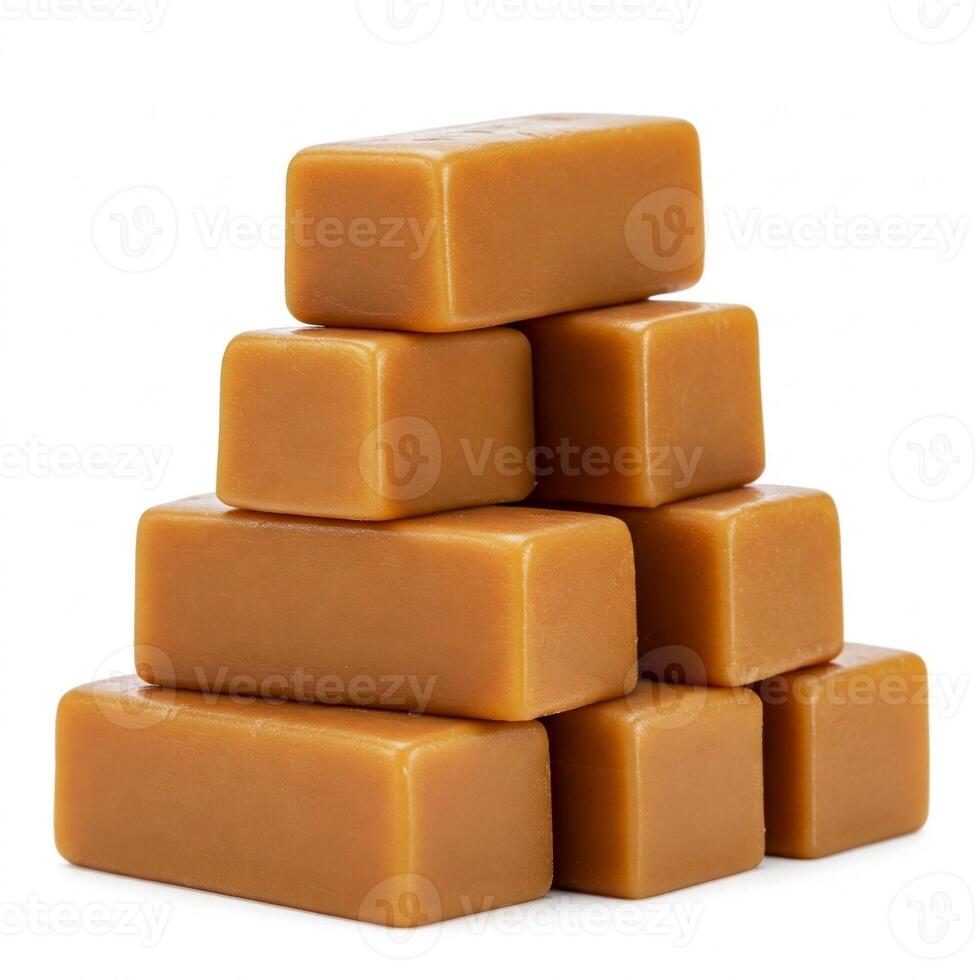 Caramel Candies Pyramid Stack on White photo