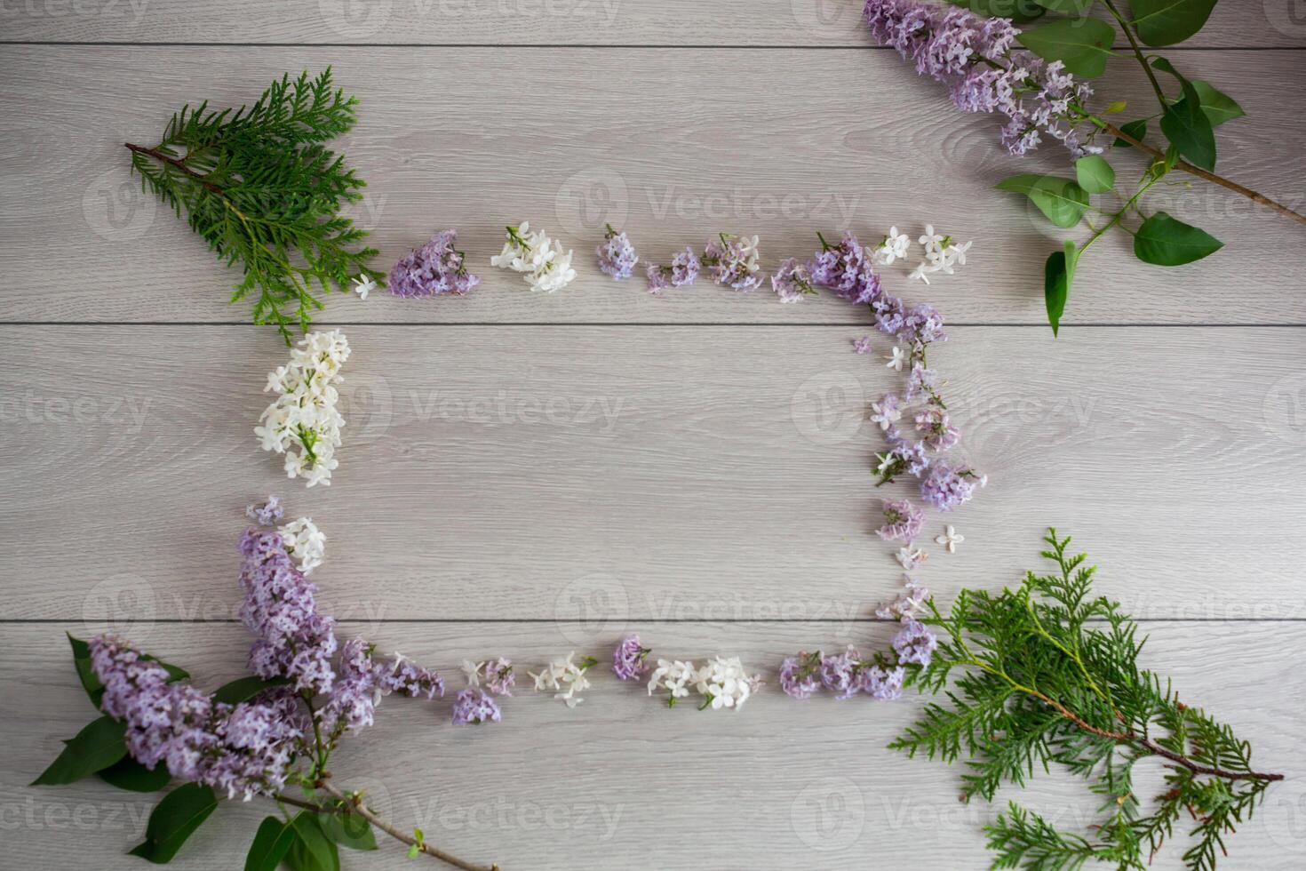 Flower frame of white and purple lilac with free space photo
