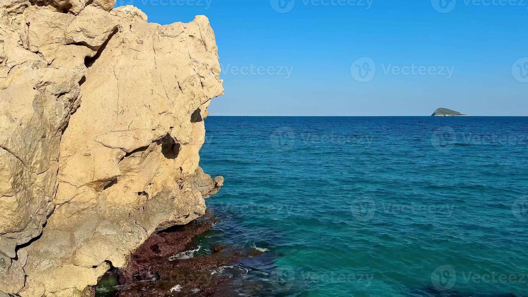 Experience breathtaking ocean scenes that beautifully showcase stunning rocky shores and tranquil turquoise waters photo
