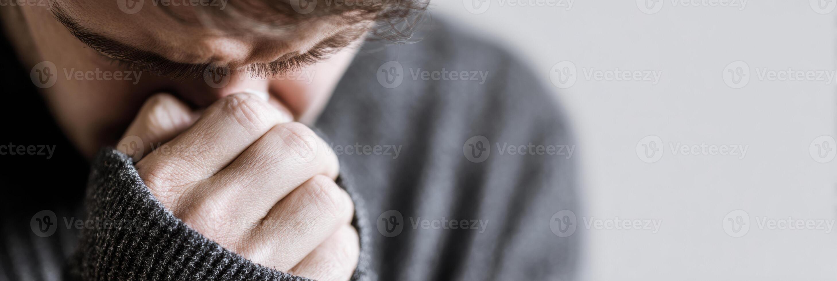 Male Figure Sneezing Into Elbow With Blurred Background Demonstrating Proper Hygiene Practices in Health Awareness photo