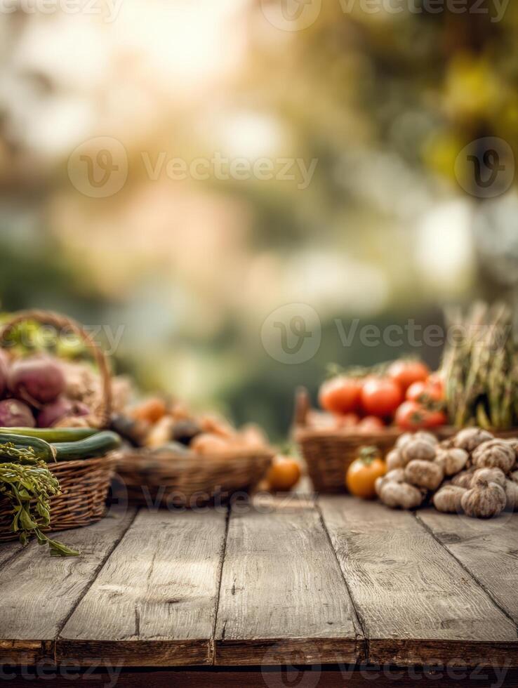 Freshly Harvested Vegetables and Fruits Arranged on Rustic Wooden Table at a Farm in Early Evening Light photo