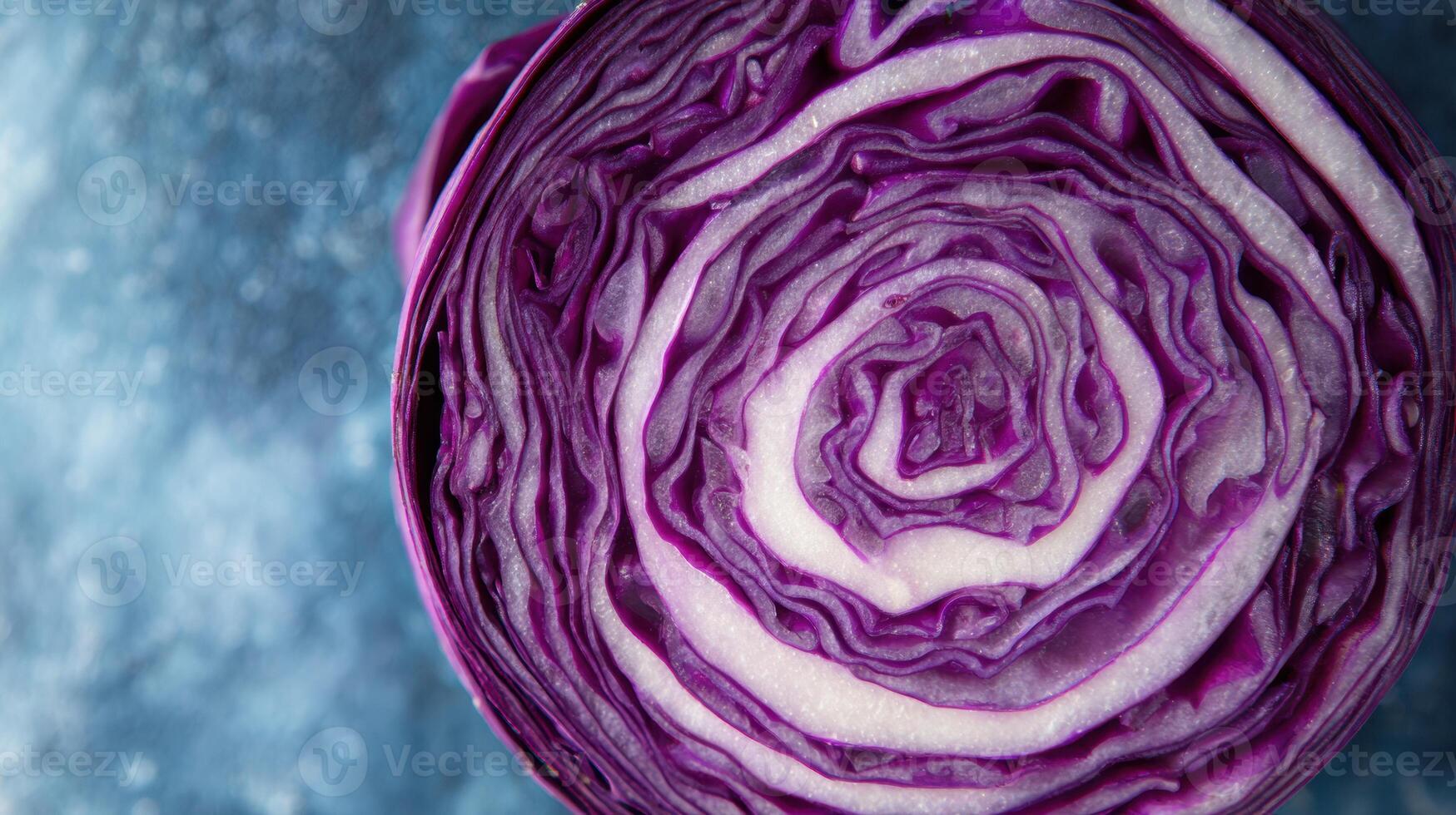 Sliced Red Cabbage Arranged in a Natural Mandala Design Showcasing Intricate Patterns and Textures Under Natural Light photo