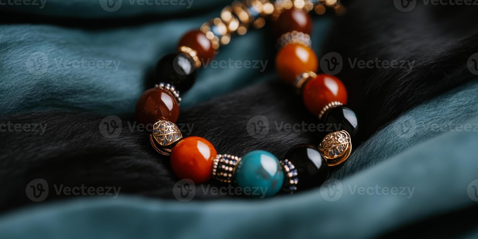 Elegant handcrafted beaded necklace displayed on soft fabric in a stylish setting with rich colors photo
