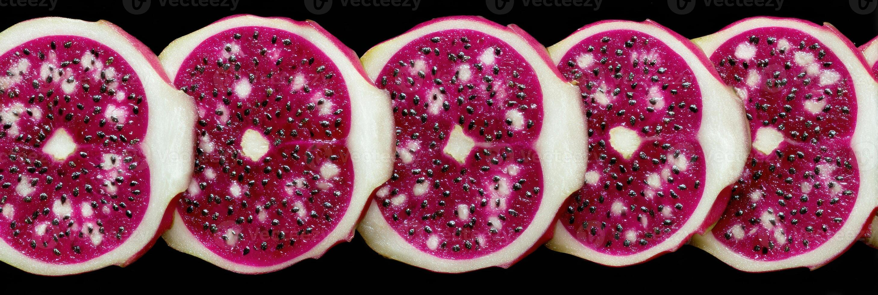 Symmetrical Overhead View of Sliced Dragon Fruit Showcasing Vibrant Colors and Unique Texture photo