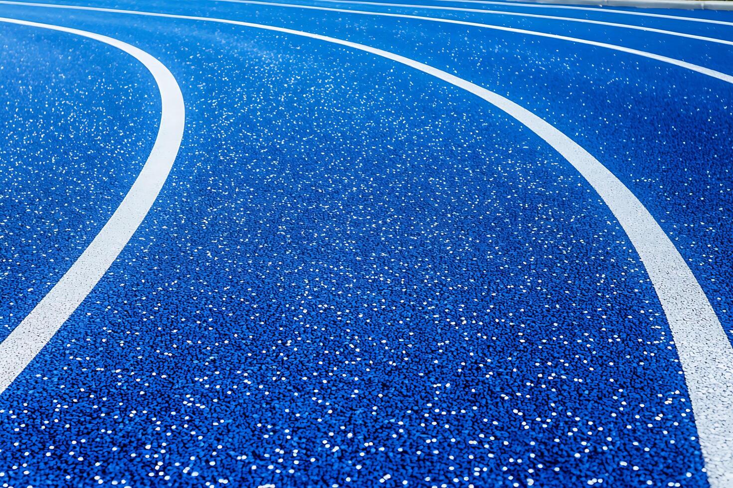 Blue Running Track Lanes A Close-Up Image of a Modern Running Track. photo