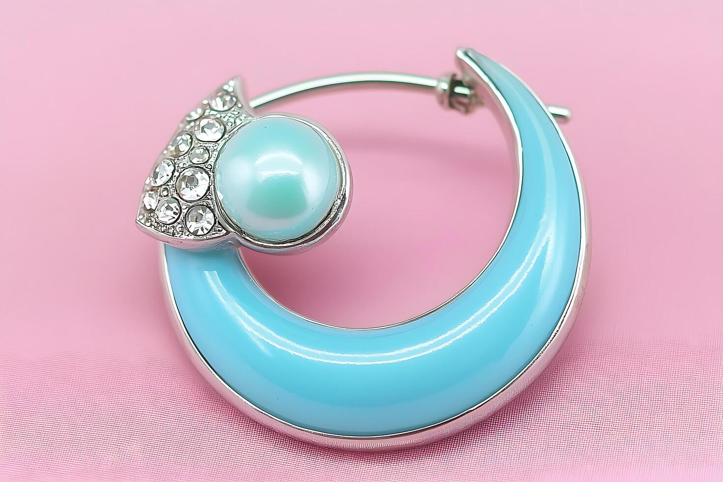 Elegant Light Blue Enamel and Crystal Hoop Earring. This stylish earring features a modern design and luxurious materials. photo