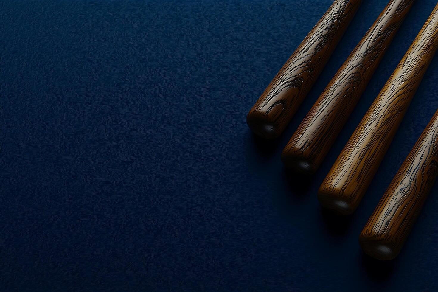Three Wooden Baseball Bats Arranged on a Dark Blue Background. A Striking Image Ideal for Sports-Related Designs. photo