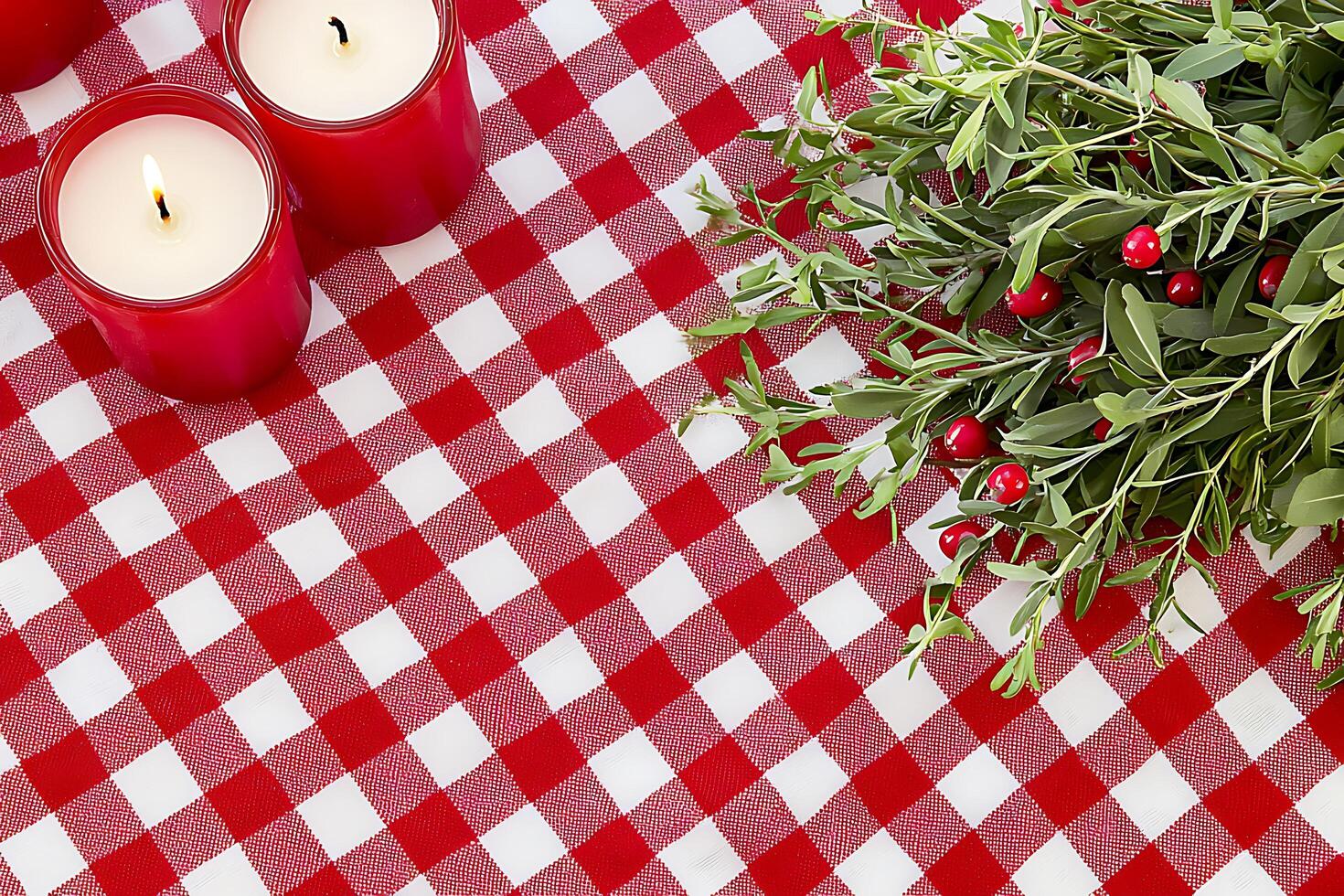 Festive Red and White Gingham Table Setting with Candles and Berries. A charming image perfect for holiday or seasonal designs. photo