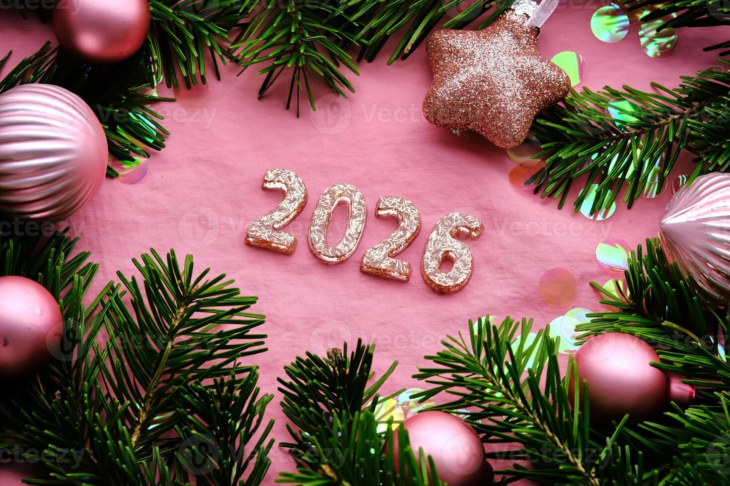 New Year 2026 pink background. Number of the coming year in Christmas decoration. photo